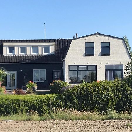 T Huuske Tuinappartement Met Fantastisch Uitzicht, Nabij Zee Zonnemaire Extérieur photo