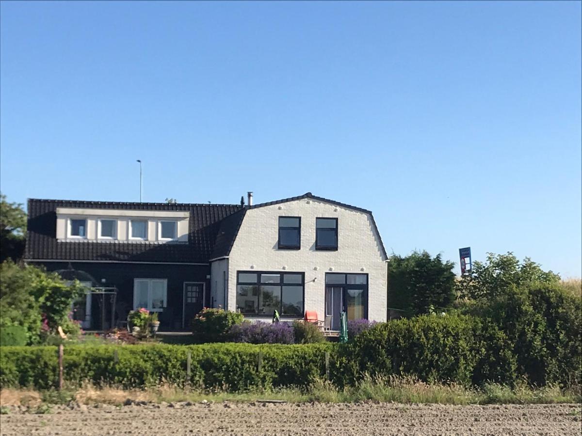 T Huuske Tuinappartement Met Fantastisch Uitzicht, Nabij Zee Zonnemaire Extérieur photo